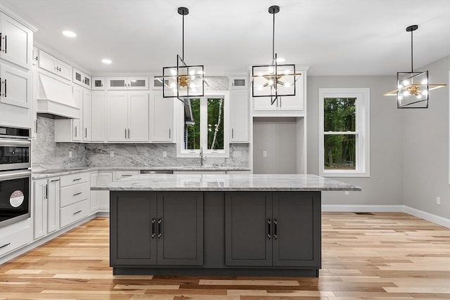 168 Justice Hill Rd Oakmont, Unit Oakmont, Sterling, MA 01564 - kitchen with a chandelier, white cabinetry, baseboards, decorative backsplash, and recessed lighting