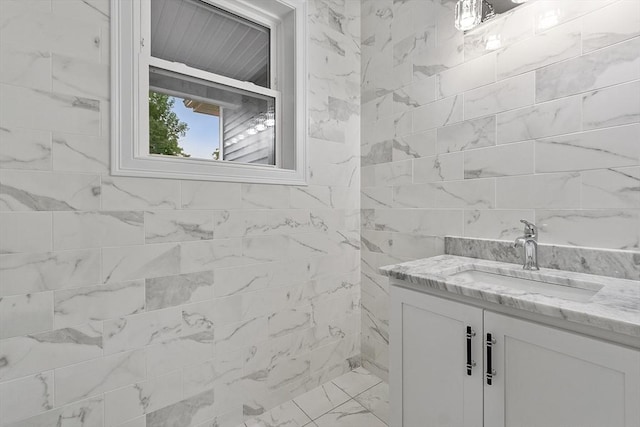 168 Justice Hill Rd Oakmont, Unit Oakmont, Sterling, MA 01564 - bathroom featuring marble look tiles and vanity
