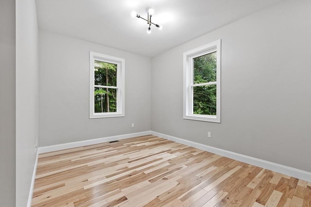168 Justice Hill Rd Oakmont, Unit Oakmont, Sterling, MA 01564 - empty room with baseboards and wood finished floors