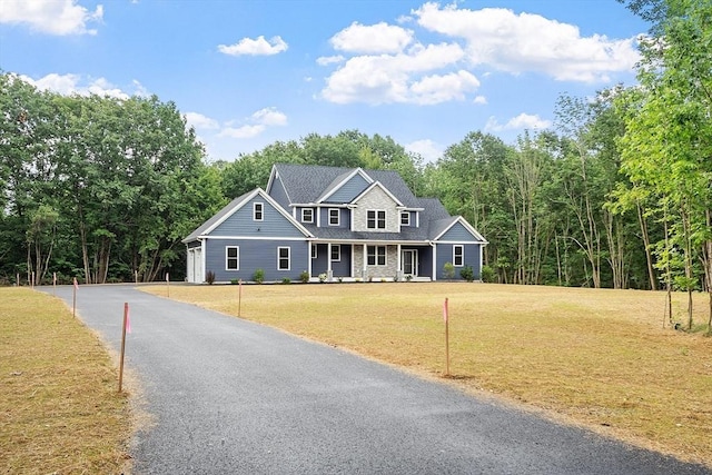 168 Justice Hill Rd Oakmont, Unit Oakmont, Sterling, MA 01564 - view of front of house with a front yard and a porch