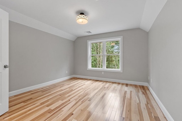 168 Justice Hill Rd Oakmont, Unit Oakmont, Sterling, MA 01564 - bonus room featuring vaulted ceiling, baseboards, and light wood finished floors