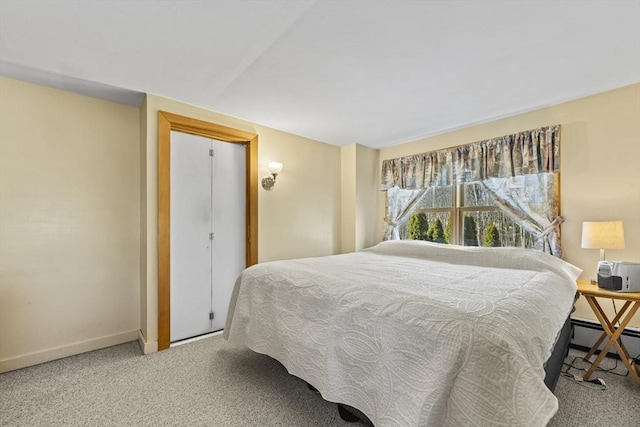 bedroom with baseboards and carpet floors