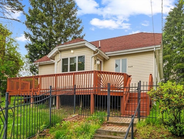 328 E Main St, Marlborough, MA 01752 - back of house featuring stairs, a wooden deck, fence, and roof with shingles