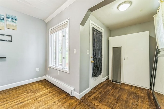 328 E Main St, Marlborough, MA 01752 - entrance foyer with a baseboard radiator, wood finished floors, and baseboards