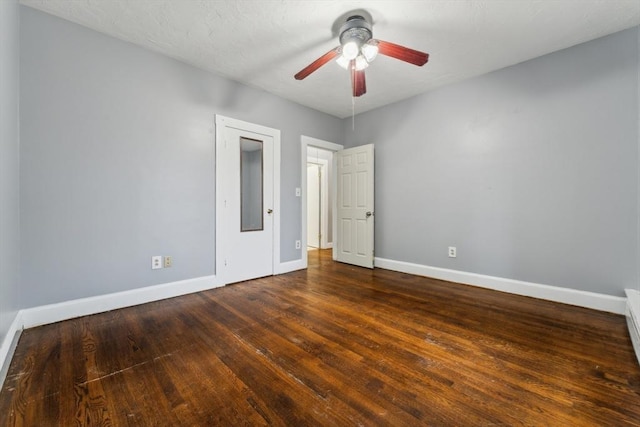 328 E Main St, Marlborough, MA 01752 - unfurnished bedroom featuring baseboards, hardwood / wood-style floors, and a ceiling fan