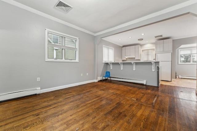 328 E Main St, Marlborough, MA 01752 - unfurnished living room with baseboard heating, crown molding, wood finished floors, a baseboard radiator, and baseboards