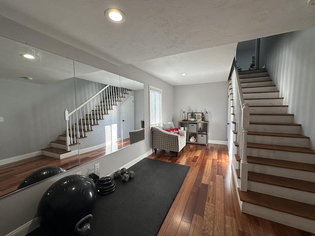 workout room featuring hardwood / wood-style flooring