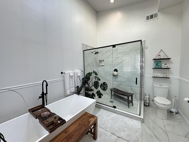 bathroom with separate shower and tub and toilet