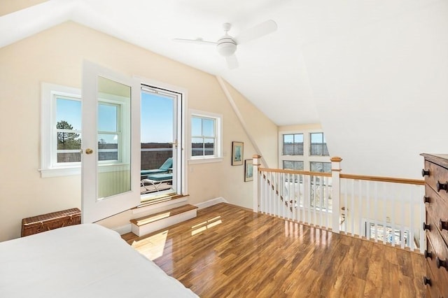 bonus room with lofted ceiling, wood finished floors, and ceiling fan