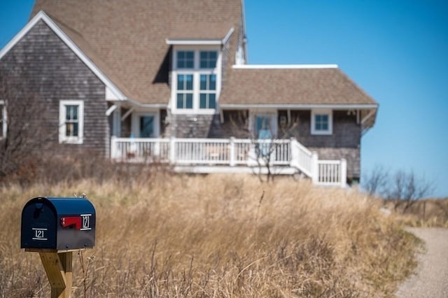 view of front of home featuring a wooden deck