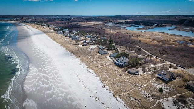 bird's eye view with a view of the beach and a water view