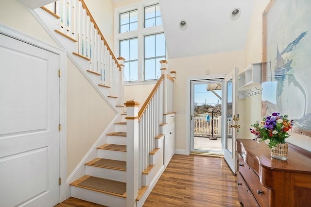 interior space featuring stairway and wood finished floors