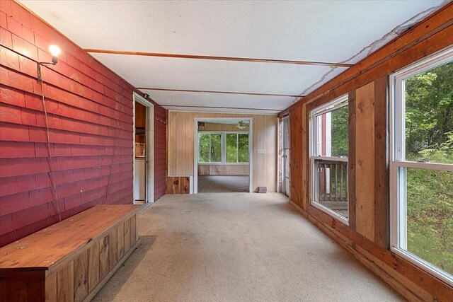 21 City Depot Rd, Charlton, MA 01507 - unfurnished sunroom with wood walls and carpet