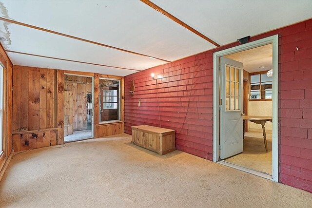 21 City Depot Rd, Charlton, MA 01507 - empty room featuring carpet flooring and wooden walls