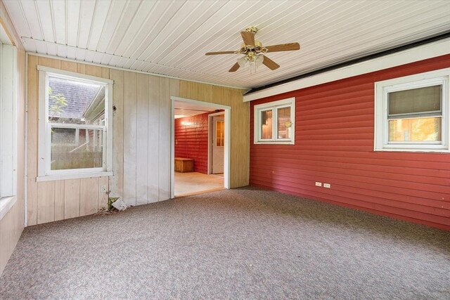 21 City Depot Rd, Charlton, MA 01507 - carpeted spare room featuring wood walls, ceiling fan, and wooden ceiling