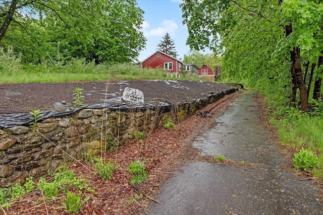 21 City Depot Rd, Charlton, MA 01507 - view of yard featuring a barn, an outbuilding, and driveway