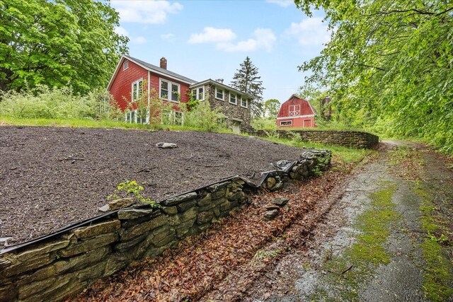21 City Depot Rd, Charlton, MA 01507 - view of yard featuring a barn and an outdoor structure
