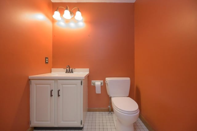19 Spruce Pond Rd Unit 19, Franklin, MA 02038 - bathroom with toilet, vanity, and baseboards