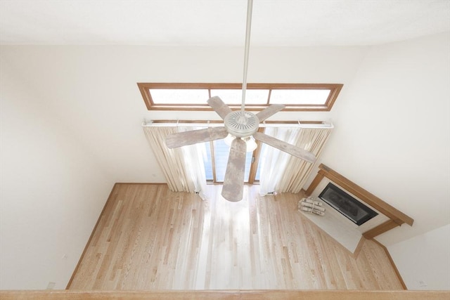 19 Spruce Pond Rd Unit 19, Franklin, MA 02038 - detailed view of wood finished floors, a fireplace, and a ceiling fan