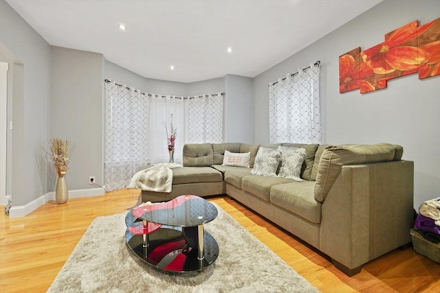 540 Rivet St, New Bedford, MA 02740 - living room with wood finished floors, recessed lighting, and baseboards