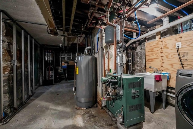 540 Rivet St, New Bedford, MA 02740 - utilities with washer / clothes dryer, water heater, and a heating unit