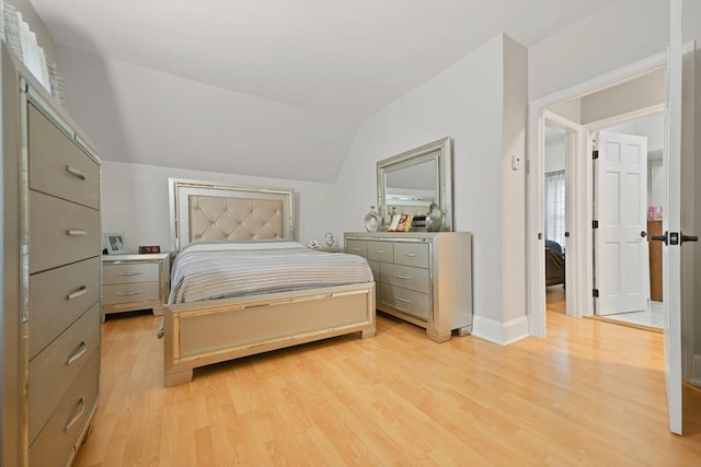 540 Rivet St, New Bedford, MA 02740 - bedroom with light wood finished floors, vaulted ceiling, and baseboards