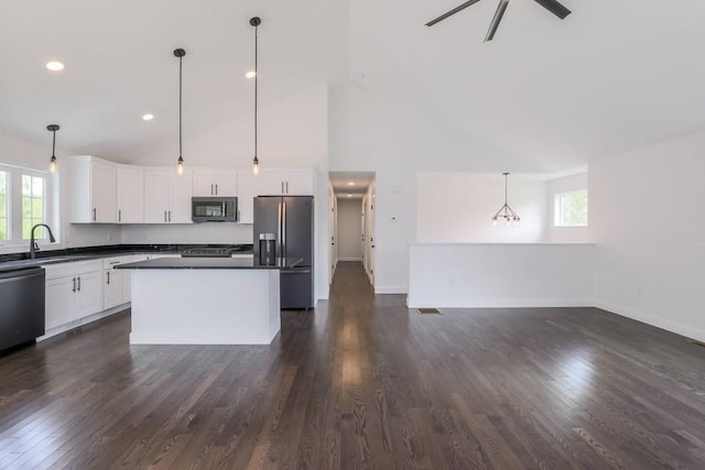 40 Jackson Ln, Barre, MA 01005 - kitchen with stainless steel appliances, a sink, healthy amount of natural light, a center island, and high vaulted ceiling