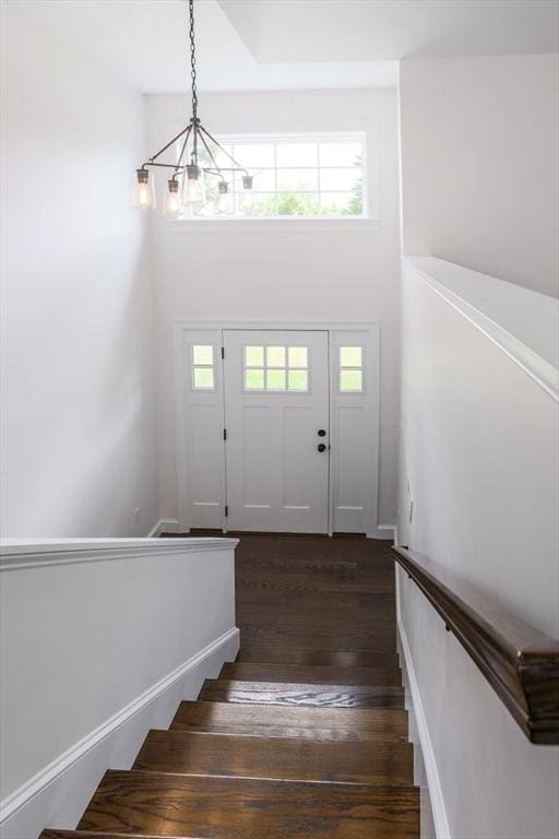 40 Jackson Ln, Barre, MA 01005 - entrance foyer with a chandelier, dark wood-style flooring, a high ceiling, and stairway
