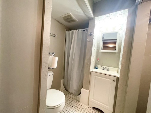 full bathroom featuring tile patterned flooring, vanity, toilet, and shower / bathtub combination with curtain