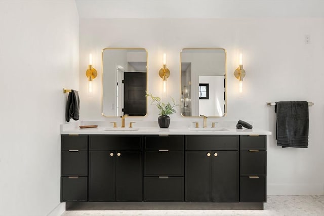 full bath featuring double vanity and a sink