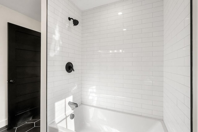 bathroom with shower / tub combination