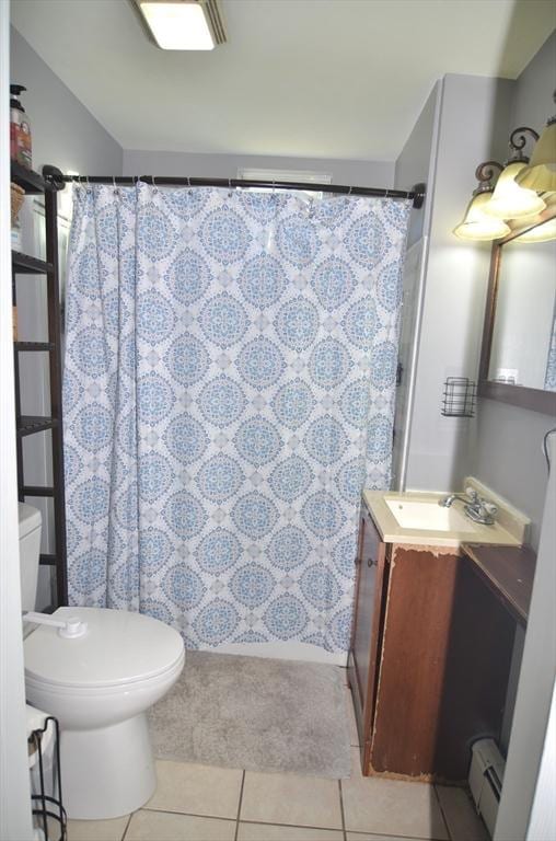 bathroom featuring toilet, walk in shower, tile patterned flooring, baseboard heating, and vanity