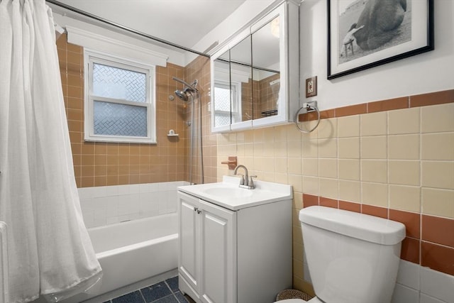 65-67 Westchester Rd, Newton, MA 02458 - full bathroom featuring shower / bath combination with curtain, toilet, tile walls, vanity, and tile patterned floors