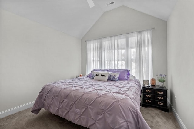 bedroom featuring lofted ceiling, carpet, visible vents, and baseboards