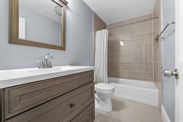 full bathroom with toilet, vanity, and shower / bath combo with shower curtain