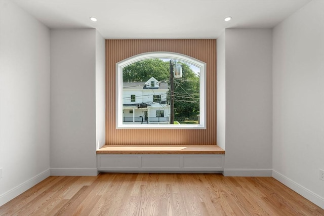 empty room with light wood-type flooring