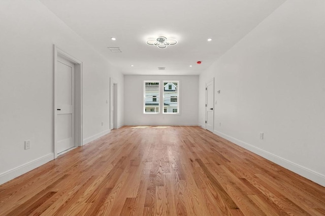 empty room with light wood-type flooring