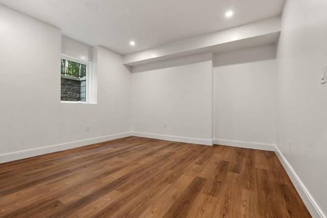 basement featuring wood-type flooring