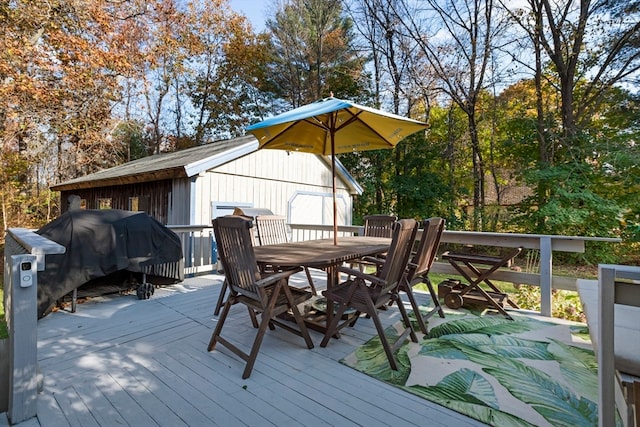 wooden deck featuring grilling area