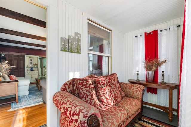 living area with hardwood / wood-style flooring and plenty of natural light