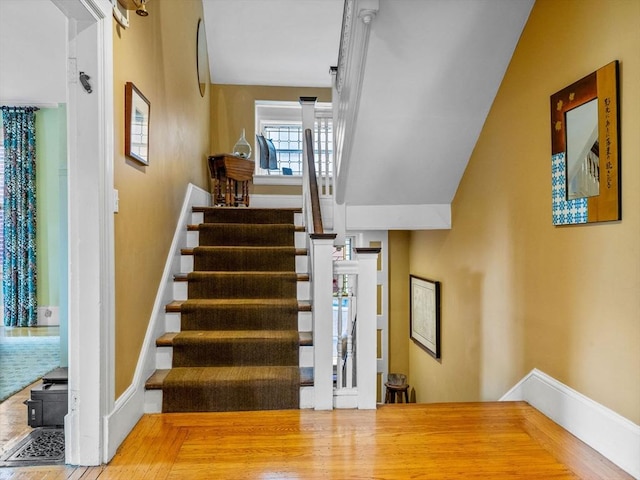 4 Greenough Ave, Boston, MA 02130 - stairway featuring wood finished floors and baseboards