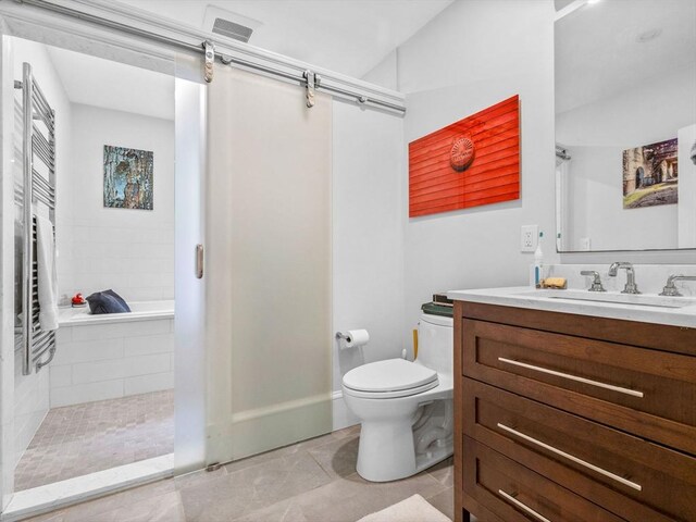 4 Greenough Ave, Boston, MA 02130 - bathroom with vanity, toilet, a shower, a towel warmer, and tile patterned floors