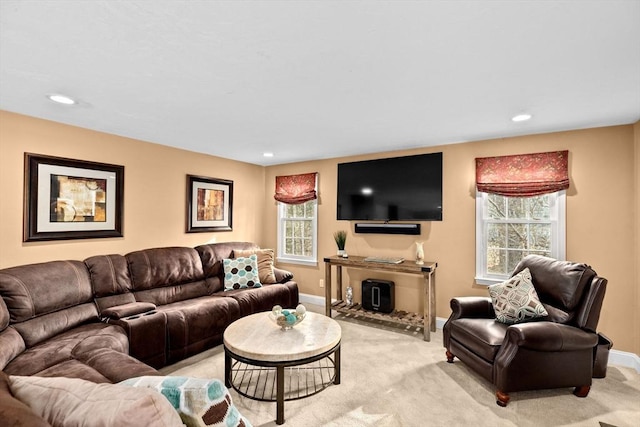 living room featuring light carpet