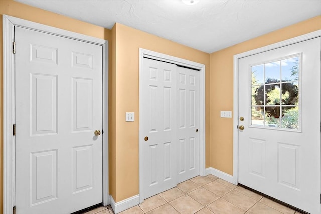 view of tiled entrance foyer