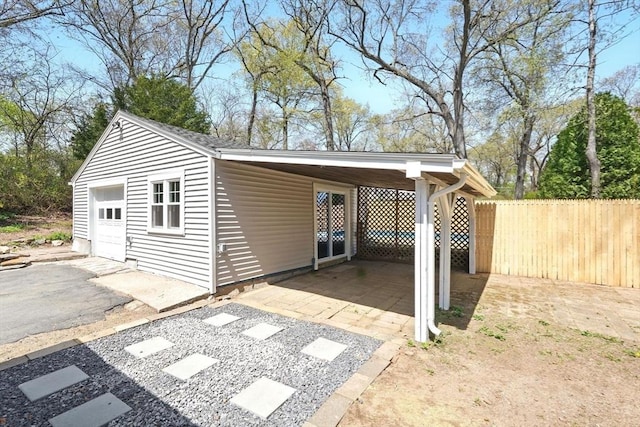 view of outdoor structure featuring an outdoor structure and fence