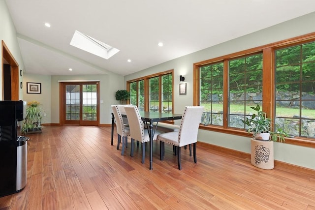 41B Washington St, Boxford, MA 01921 - dining space with lofted ceiling, a skylight, light wood-style floors, and recessed lighting