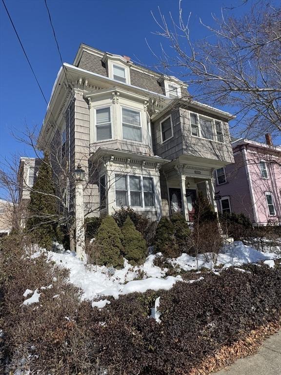 second empire-style home featuring mansard roof