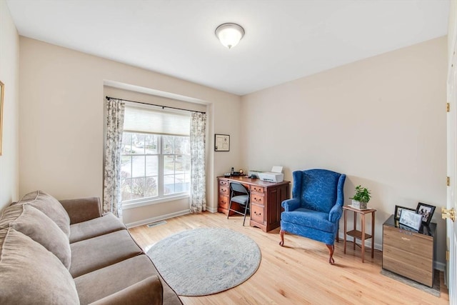 office with hardwood / wood-style floors