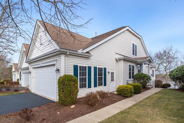 view of home's exterior featuring a garage