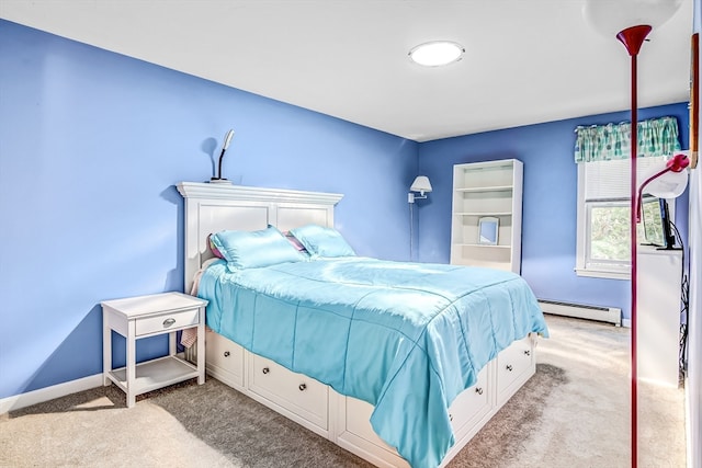 bedroom featuring baseboard heating and light colored carpet